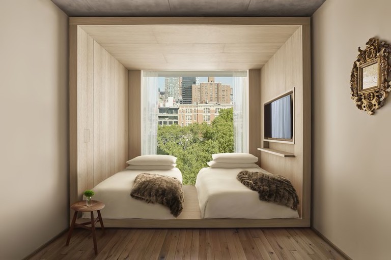 A twin pod room overlooking a park at the PUBLIC.